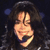 Pixelated static image of a person with long dark hair making a peace sign gesture against a dark background with blue circular highlights.