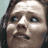 six showing a woman's face, a hockey mask, and text reading "FREDDY VS JASON" in white serif font on blue background