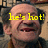 Pixelated close-up of a bald man's face with yellow text overlay reading 'he's hot!' against a blurred background.