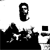 Black-and-white pixelated icon with a stylized figure above repeating text 'DAVID' in two horizontal lines.