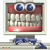 Pixelated computer monitor displays a mouth with teeth and eyes, showing two states: closed mouth with red lips and open mouth revealing black tongue.