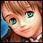Pixelated anime-style character with brown hair and green eyes, wearing a blue and purple collar, next to black background with white text.