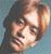 Four pixelated headshots of a person with light brown hair against varying solid backgrounds, each showing distinct facial expressions and angles.