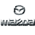 A grayscale Mazda logo with a circular emblem above stylized text reading 'MAZDA' in pixelated font.
