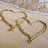 Two heart outlines drawn in sand with text reading 'All I Want Is To Stay Wit You 4EVER!!' on a beach background.