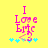 Yellow background with pink text "I Love Britney" and blue star shapes, where the 'y' in 'Britney' has a blue and purple gradient on its lower part.