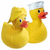 Two yellow rubber ducks with orange beaks, one wearing a white chef's hat, positioned side-by-side against a plain background.