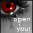 A grayscale close-up of a person's face with red eyes, displaying text that changes across frames.