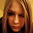 A 48x48 pixel buddy icon split into two frames showing a person with long light brown hair on the left and green text reading "Original Icons .com" on a dark green background on the right.