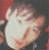 A three- shows a person with dark hair in different poses: left has hand near face, right shows open mouth, bottom is neutral expression