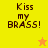 Four display 'Kiss my BRASS!' text with a star; top-left and bottom-left show orange stars, top-right and bottom-right show yellow stars