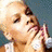 Four- shows a person with short blonde hair in different poses, including one with pink background and white text