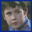 four pixelated images showing a child in blue clothing with varying poses and expressions against dark backgrounds