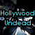 Pixelated image with cyan text 'Hollywood Undead' over dark background featuring abstract shapes and light-colored elements.