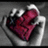 A hand holds a red cylindrical object with visible text, set against a grayscale background.