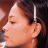 A 48x48 pixel buddy icon split into two sections: a profile portrait of a person with dark hair and earrings on the left, and green text reading "Original Icons .com" on a dark green background on the right.