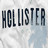 Static pixelated image of the word "HOLISTER" in bold dark letters against a light background with subtle blue and gray tones.