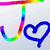 Rainbow-colored J-shaped line with blue heart outline on white background, animated heart outline changes shape.