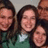 A split-screen image with a group photo on the left and pixelated text on a bright pink background on the right.