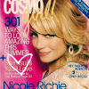 A static image of a magazine cover featuring a woman with blonde hair and a light-colored top against a pink background with text elements.