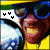 Animated contact sheet of four frames showing a person in yellow shirt and blue goggles with changing heart symbols above head.