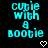 Pixelated cyan text 'Cupie with a Bootie' on black background, two white heart symbols below.