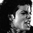 Pixelated black-and-white portrait of a person with dark hair next to bold text reading MICHAEL JACKSON NUMBER ONES in black and red lettering on white background.