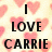 Pixelated image with pink hearts on a light background and black text reading "I LOVE CARRIE".