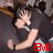 A pixelated image of a person in dark clothing with light skin, holding their hand near their face, overlaid with red text reading "BOYS ARE HOT!" across four