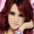 Animated sequence showing a woman with long red hair in three distinct poses: resting hand on cheek, direct gaze, and leaning forward.