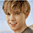 A pixelated of three distinct head-and-shoulders portraits of a young person with light brown hair, each in a different pose and background