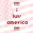 Red pixelated text on a pink and white striped background with white dots, displaying '!!!', 'i', 'luv', 'america', and repeating the sequence.
