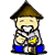 Pixelated character with brown conical hat, light skin, white beard, and blue pants holding yellow object while seated.