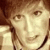 A pixelated contact sheet showing two frames of an animated buddy icon with a person's face on the left and text reading "Stewart!" on the right against a white background.