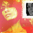 Pixelated image of a smiling face with closed eyes on red background, adjacent to black-and-white photo frame.