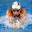 Pixelated image of a swimmer in water with text on green background reading "we swim because we are too sexy for a sport that requires clothing".