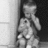 Black-and-white pixelated image of a child holding a camera, with red text overlays reading Help stop Child Abuse!