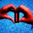 A hand forming a heart shape against a blue background, with text overlays changing across frames.