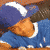 A 2x2 contact sheet of three animated frames showing a person in blue sports attire with white accents, captured from an AOL Instant Messenger buddy icon animation.