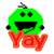 Green pixelated character with black eyes and mouth, wearing orange pants labeled 'YAY' in red text, small gray hat on top.