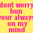 Yellow background with pink pixelated text repeating 'dont worry dont worry hun hun your always your always on my on my mind mind' and a white cursor blinking over the word 'worry'.