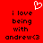Red background with black pixelated text reading 'i love being with andrew<3' repeated twice, white heart symbol above the left text block.