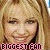 identical pixelated images showing a smiling person with blonde hair, each overlaid with pink text reading "BIGGEST FAN" and vertical color-coded symbols