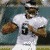 Animated sequence showing two football players in action poses, one in white jersey with number 9 and another in dark green jersey with number 20, followed by a static logo of an eagle on green background.