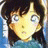 A pixelated anime-style character with brown hair and blue eyes appears on the left side of a contact sheet, while the right side displays text reading "Anime IM" above "COM" in white pixelated font against black background.