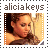 Alicia Keys' pixelated portrait with warm lighting, framed by a dotted border, and text above reading 'alicia keys' in lowercase.