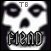 Pixelated grayscale icon of a stylized skull with large circular eyes, triangular nose, and jagged teeth; top text reads "TB" in blocky font.