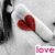A black-and-white image of a person with red lips forming a heart shape, overlaid with pink text reading "love," "is," and "an" in the top and "everlasting" and "desire" in the bottom