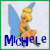Pixelated icon of a fairy-like figure with blue wings and yellow hair, wearing an orange dress with green accents, positioned above the name "MICHELE" in bold blue letters.