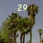 Pixelated image of palm trees with text '29' and 'palms' overlaid on a light blue background.